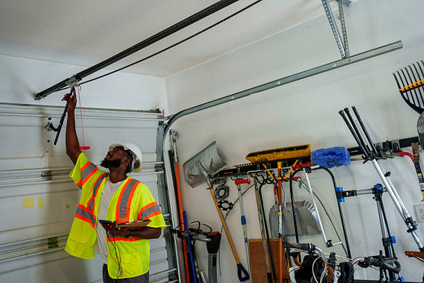 Professional Garage Door Off Track Repair technician working in East Glenville, NY